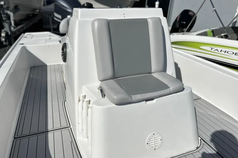 Slide: The Image of 2011 Cape Horn 23 Cape Bay boat interior with gray cushioned seating. - 20
