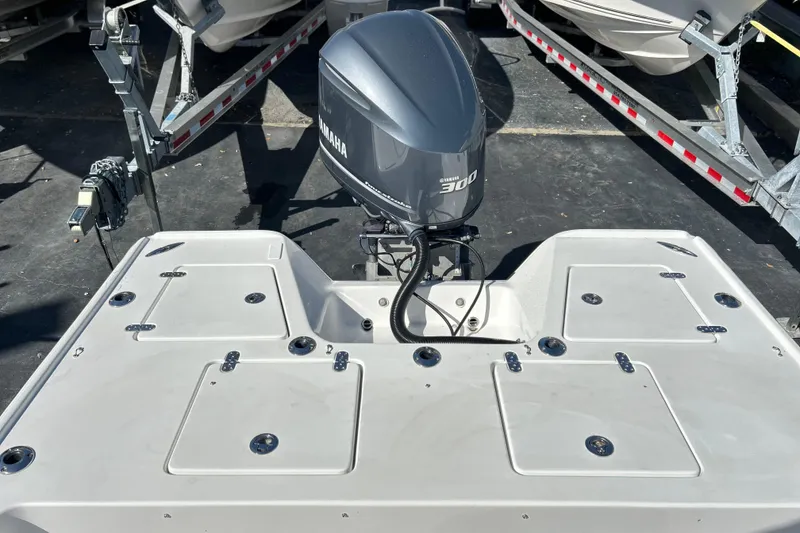 Slide: The Image of 2011 Cape Horn 23 Cape Bay boat with Yamaha 300 engine, docked on trailer. - 21