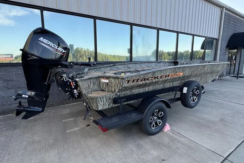 Slide: The Image of 2026 Tracker Grizzly 1756 T Marsh boat with Mercury engine on trailer. - 4