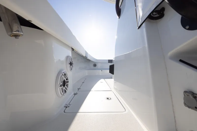 Slide: The Image of 2023 Freeman 34VH boat interior with speakers and storage compartments. - 24
