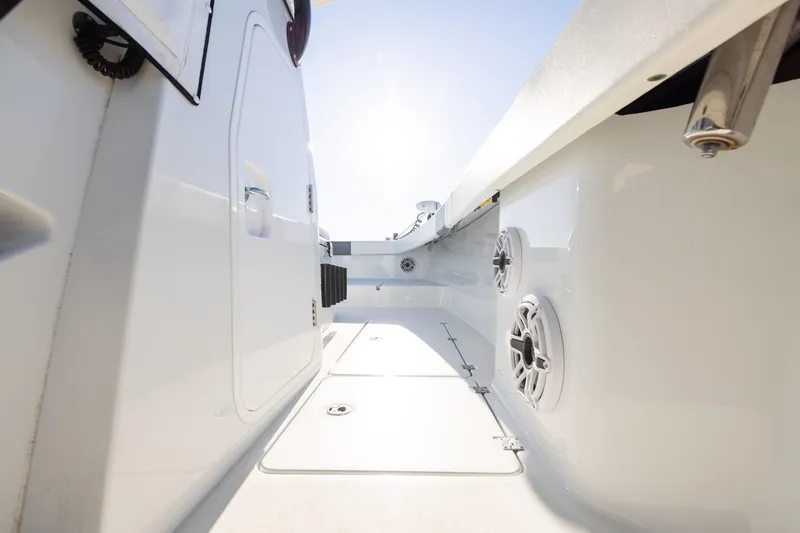 Slide: The Image of 2023 Freeman 34VH boat interior with speakers and storage compartments. - 25