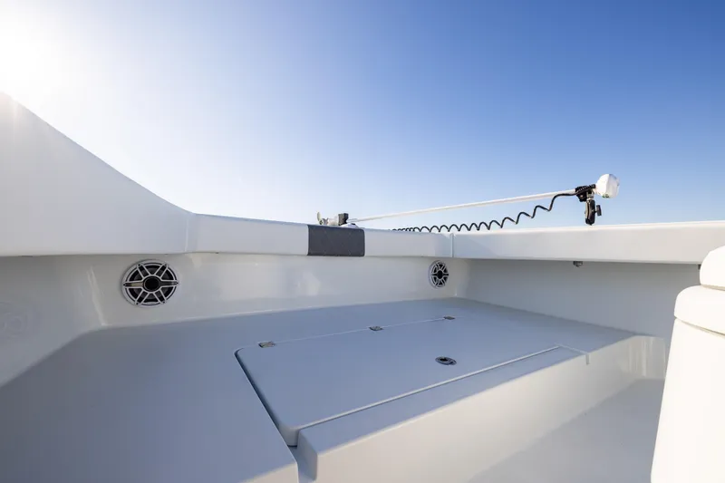 Slide: The Image of 2023 Freeman 34VH boat deck with speakers and clear blue sky. - 28