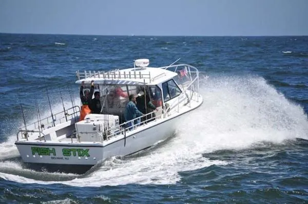 Slide: The Image of Island Hopper Open Fisherman 1987 - 6