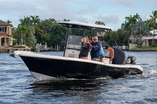 The Image of 2026 Sea Chaser 24 HFC boat displayed indoors, showcasing sleek design and modern features. - 0