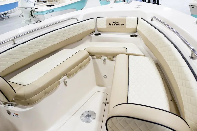 Slide: The Image of Manufacturer Provided Image: 2026 Sea Chaser 24 HFC boat on water with passengers. - 4