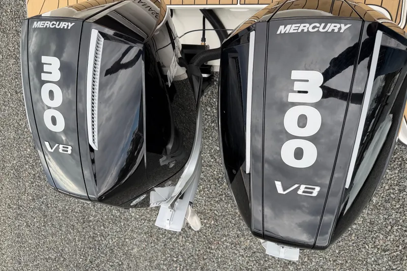 Slide: The Image of Twin Mercury 300 V8 outboard engines on a 2023 Sea Ray SLX 310 boat. - 5