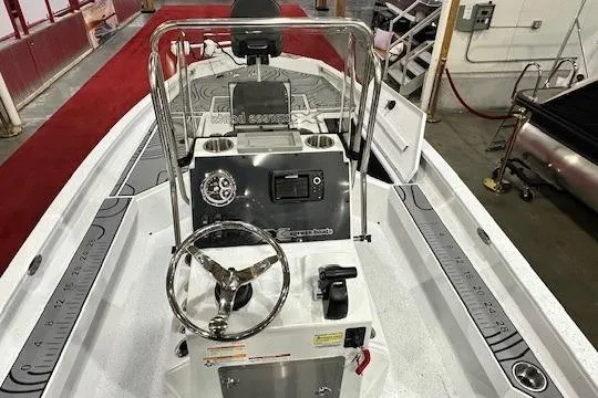 Slide: The Image of 2025 Xpress H22B Bay boat interior with steering console and controls. - 3