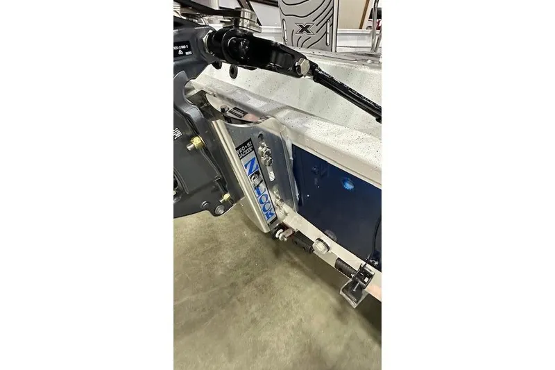 Slide: The Image of 2025 Xpress H22B Bay boat transom with motor mount and hydraulic steering. - 5