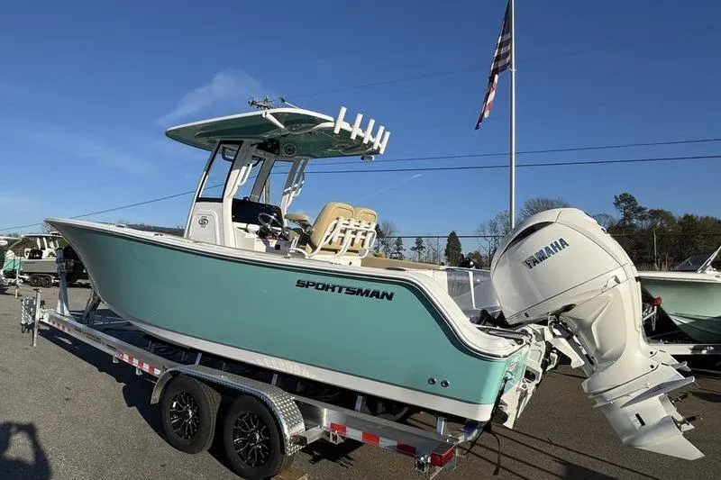 Slide: The Image of 2026 Sportsman Open 252 Center Console boat on trailer, featuring Yamaha outboard motor. - 29