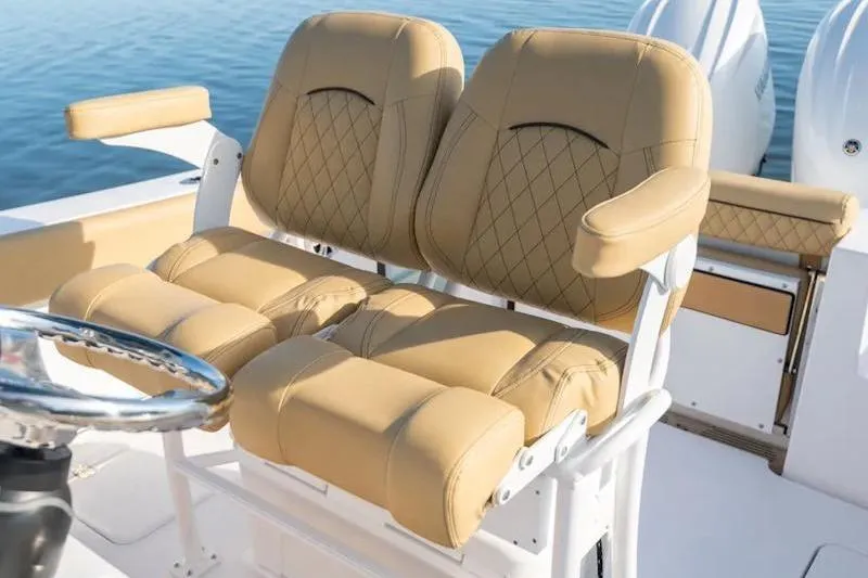 Slide: The Image of 2026 Sportsman Open 252 Center Console boat with tan leather seating. - 3