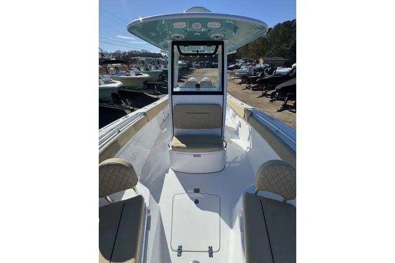 Slide: The Image of 2026 Sportsman Open 252 Center Console boat with seating and console view. - 8