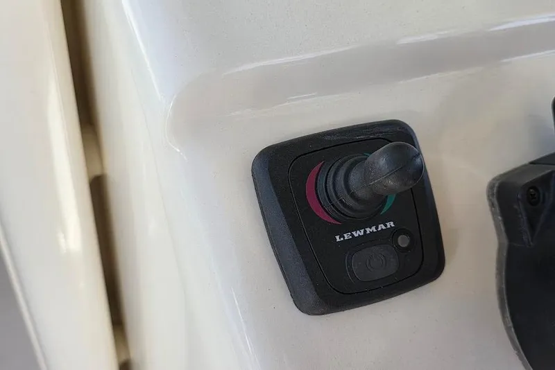 Slide: The Image of Lewmar control switch on 2015 Scout 350 LXF boat dashboard. - 57