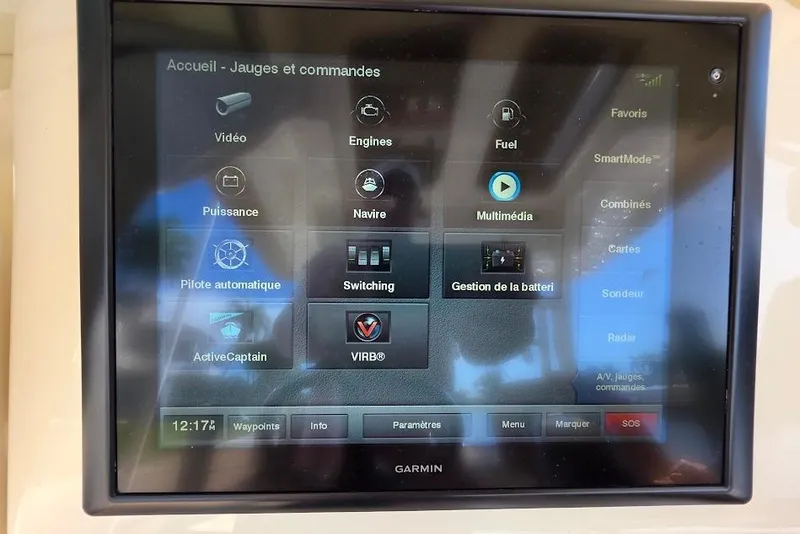 Slide: The Image of Garmin marine display on 2015 Scout 350 LXF showing navigation and control options. - 58
