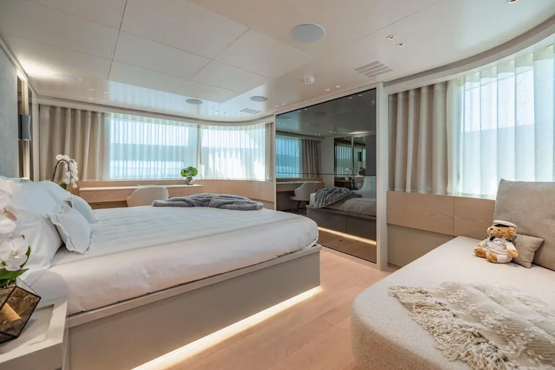 Slide: The Image of Luxurious bedroom interior of 2022 Sanlorenzo SD96 yacht, featuring elegant decor and natural lighting. - 15