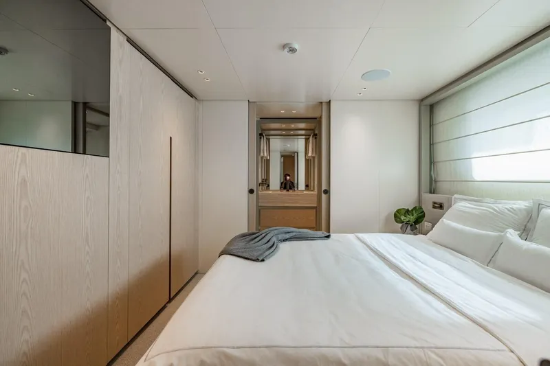 Slide: The Image of Luxurious bedroom interior of 2022 Sanlorenzo SD96 yacht, featuring modern design and elegant furnishings. - 27