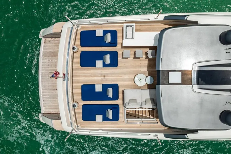 Slide: The Image of Aerial view of 2022 Sanlorenzo SD96 yacht deck with sun loungers and seating. - 42