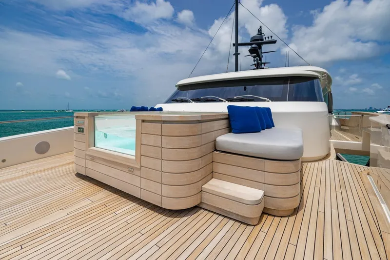 Slide: The Image of Luxurious 2022 Sanlorenzo SD96 yacht deck with jacuzzi and seating area. - 44