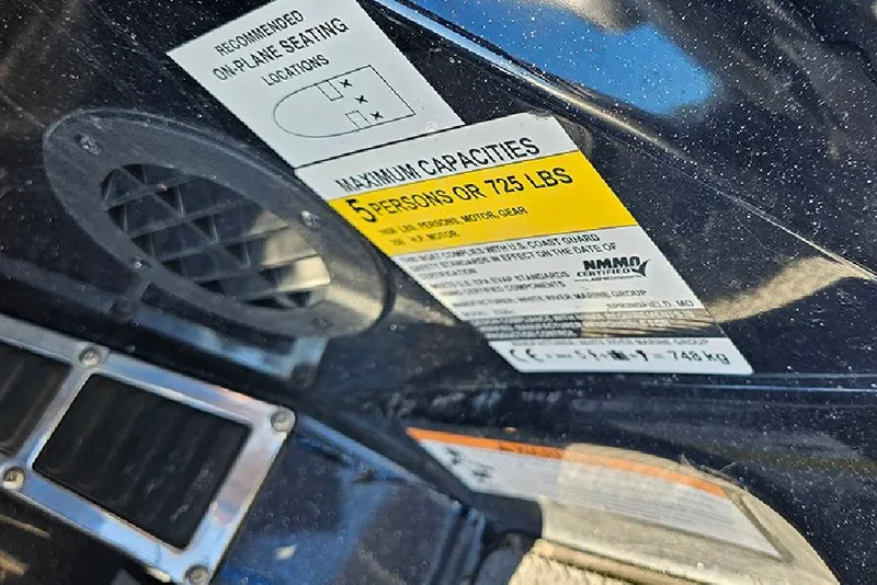 Slide: The Image of 2021 Ranger Z520C Cup-Equipped boat capacity label, seating for 5 or 725 lbs. - 10