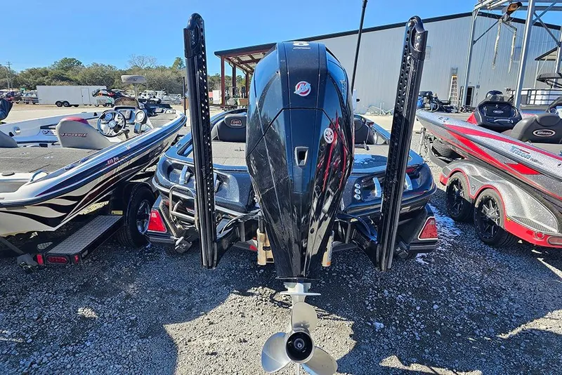 Slide: The Image of 2021 Ranger Z520C Cup-Equipped boat with powerful outboard motor, parked outdoors. - 5