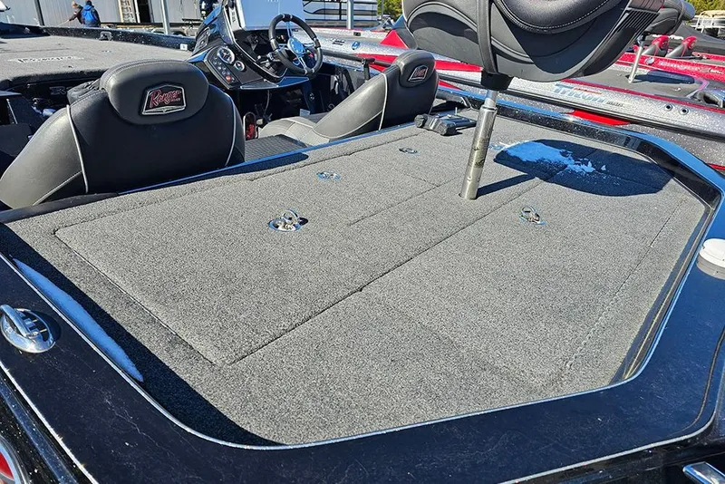 Slide: The Image of 2021 Ranger Z520C Cup-Equipped boat interior with seating and steering console. - 6