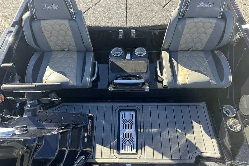 Slide: The Image of 2026 Bass Cat Puma STS interior with dual seats and modern console design. - 6