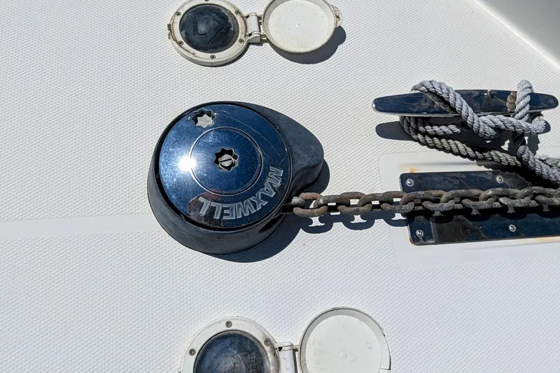 Slide: The Image of Anchor windlass and cleat on 2004 Carver 360 Mariner boat deck. - 28
