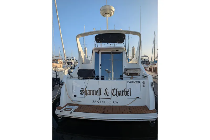 Slide: The Image of 2004 Carver 360 Mariner yacht docked in San Diego marina, rear view. - 3