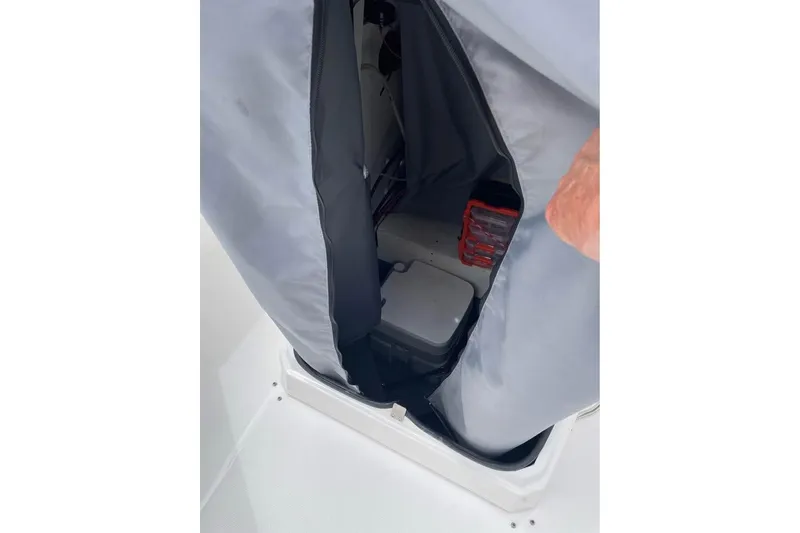 Slide: The Image of Interior storage compartment of 2022 Yamaha Boats 252 FSH Sport. - 7