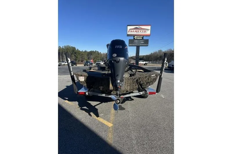 Slide: The Image of 2026 Xpress H190B Bay boat on trailer, rear view with outboard motor. - 3