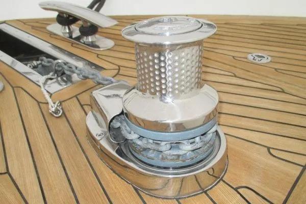 Slide: The Image of chrome winch on teak deck - 30