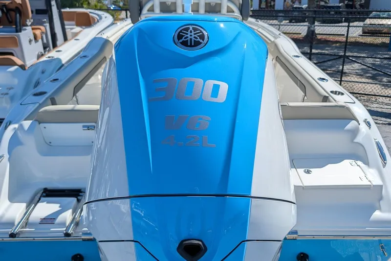 Slide: The Image of 2026 Key West 239 FS boat with Yamaha 300 V6 4.2L engine, rear view. - 6