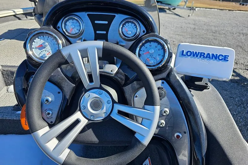 Slide: The Image of Steering wheel and dashboard of a 2021 Tracker Pro Team 175 TXW. - 10