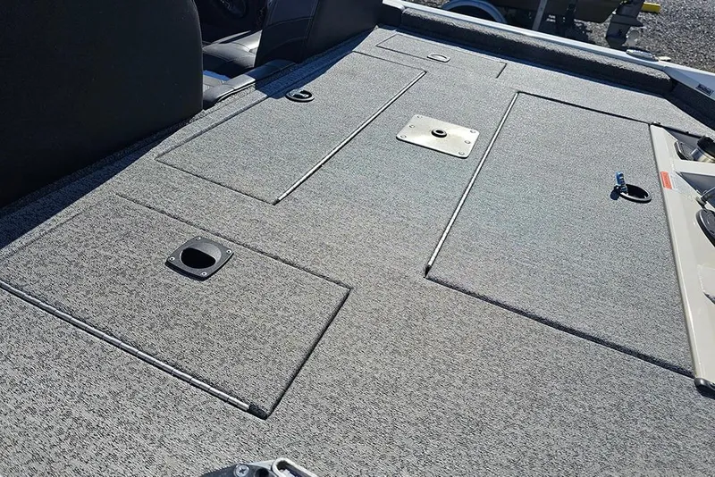 Slide: The Image of 2021 Tracker Pro Team 175 TXW boat deck with storage compartments. - 8