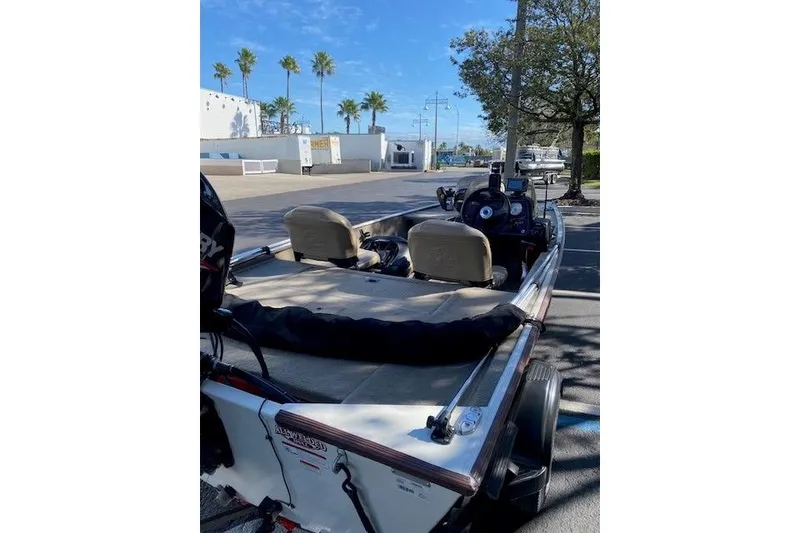 Slide: The Image of 2022 Tracker Bass Tracker Classic XL boat parked outdoors on a sunny day. - 5