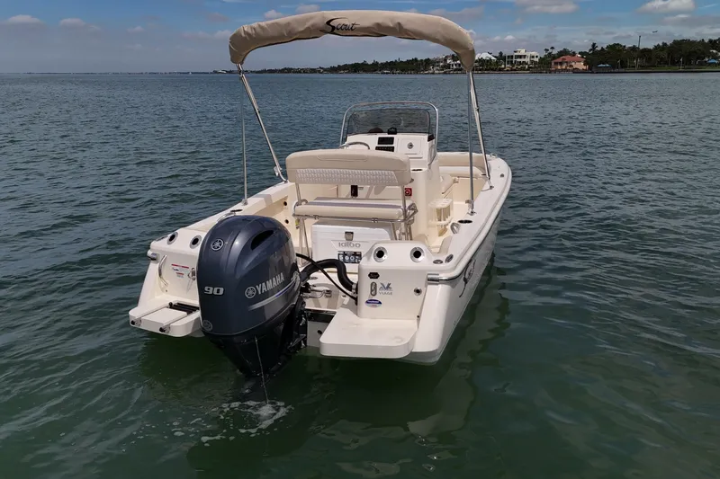 Slide: The Image of 2026 Scout 188 Sportfish boat with Yamaha engine on calm water. - 19