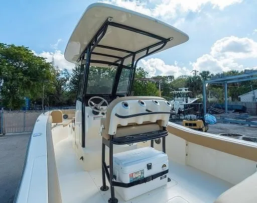 Slide: The Image of Scout 240 XSF 2026 boat with helm and seating area. - 2