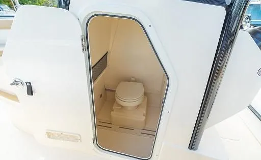 Slide: The Image of Interior of 2026 Scout 240 XSF featuring a toilet. - 6