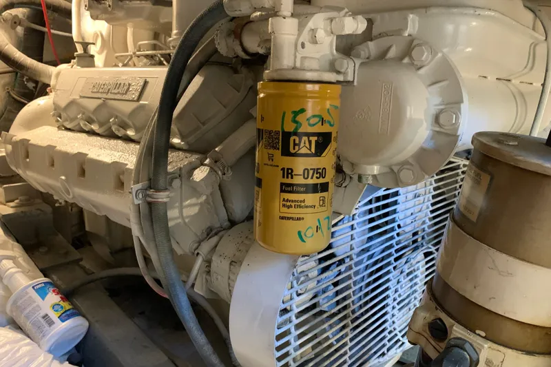 Slide: The Image of Engine room of 1991 Hatteras 40 Motor Yacht with CAT fuel filter. - 120