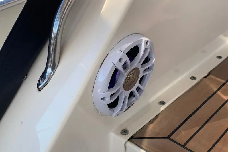 Slide: The Image of Speaker and railing on 1991 Hatteras 40 Motor Yacht deck. - 128