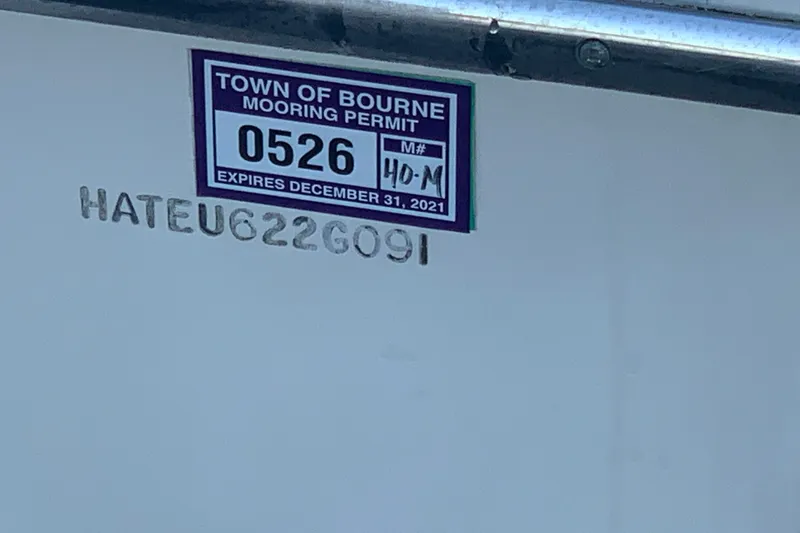 Slide: The Image of 1991 Hatteras 40 Motor Yacht with Town of Bourne mooring permit, expiring December 31, 2021. - 133
