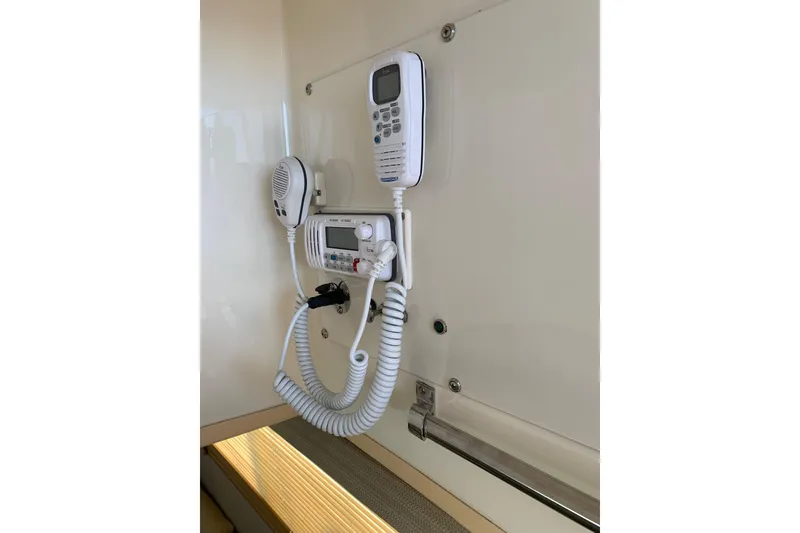 Slide: The Image of VHF radio system on 1991 Hatteras 40 Motor Yacht interior wall. - 59