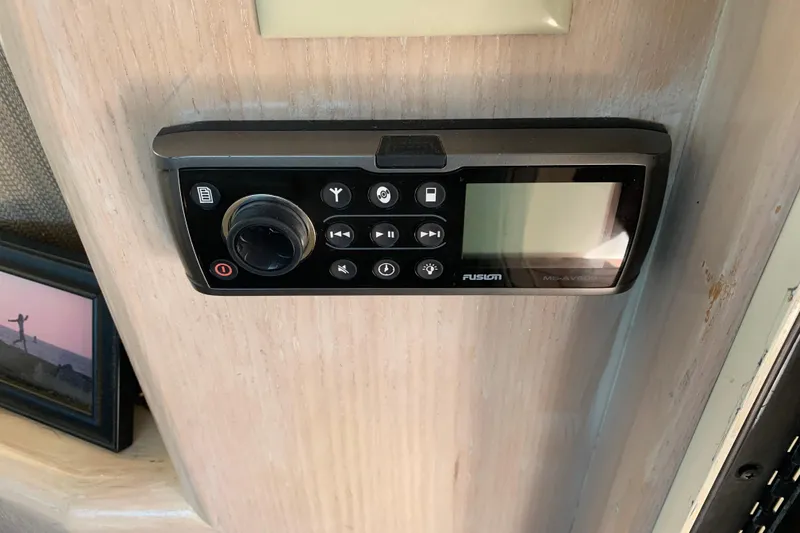 Slide: The Image of Fusion audio system on 1991 Hatteras 40 Motor Yacht interior wall. - 61