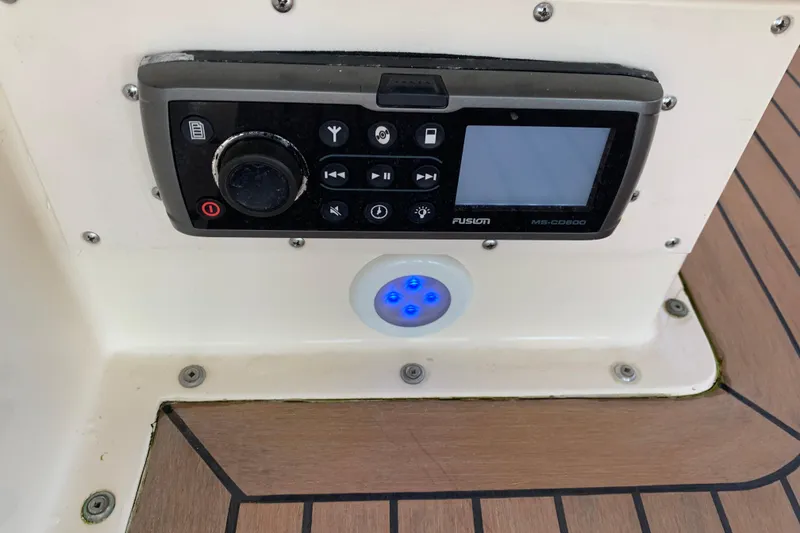 Slide: The Image of Control panel on 1991 Hatteras 40 Motor Yacht with Fusion MS-CD600 stereo system. - 65