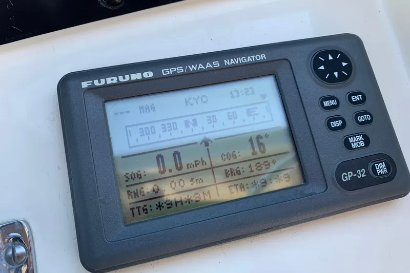 Slide: The Image of Furuno GPS navigator on 1991 Hatteras 40 Motor Yacht, displaying navigation data. - 68
