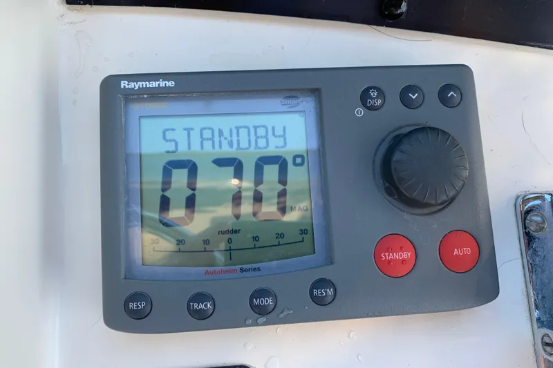 Slide: The Image of Raymarine autopilot display on 1991 Hatteras 40 Motor Yacht showing standby mode. - 69