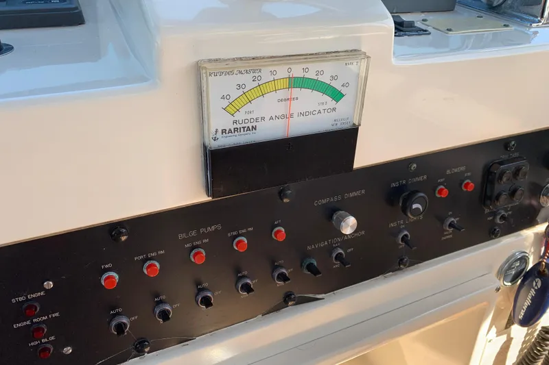 Slide: The Image of Control panel of a 1991 Hatteras 40 Motor Yacht with rudder angle indicator. - 74