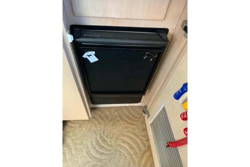 Slide: The Image of Black U-Line refrigerator in 1991 Hatteras 40 Motor Yacht interior. - 91