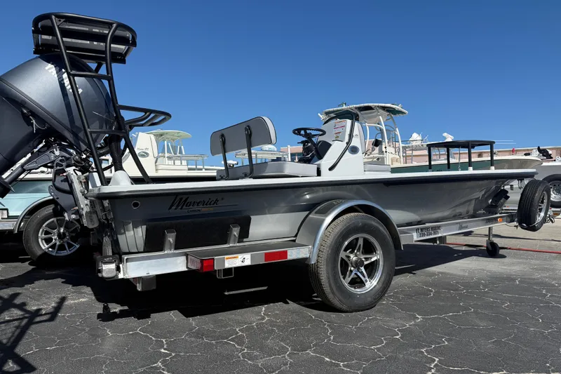 Slide: The Image of 2026 Maverick 17 HPX-S boat on trailer, parked outdoors under clear blue sky. - 7