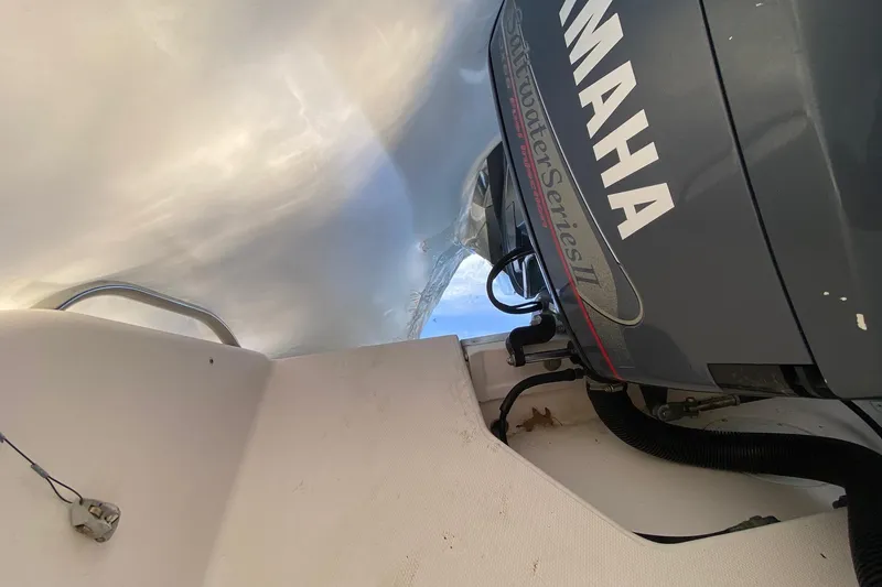 Slide: The Image of 1999 Grady-White Chase 263 boat with Yamaha outboard engine, interior view. - 32