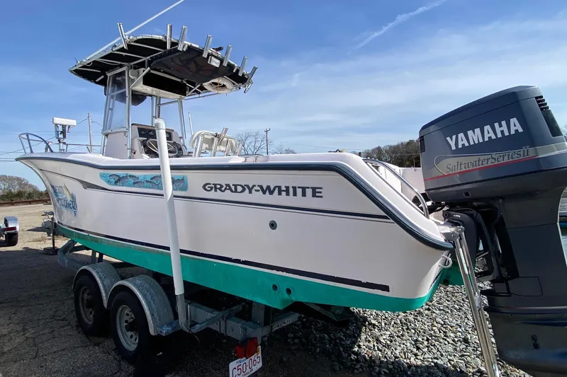 Slide: The Image of 1999 Grady-White Chase 263 boat with Yamaha Saltwater Series II engine on trailer. - 33